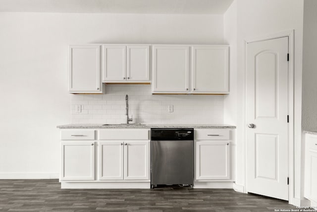 kitchen with dark hardwood / wood-style floors, dishwasher, sink, and white cabinets