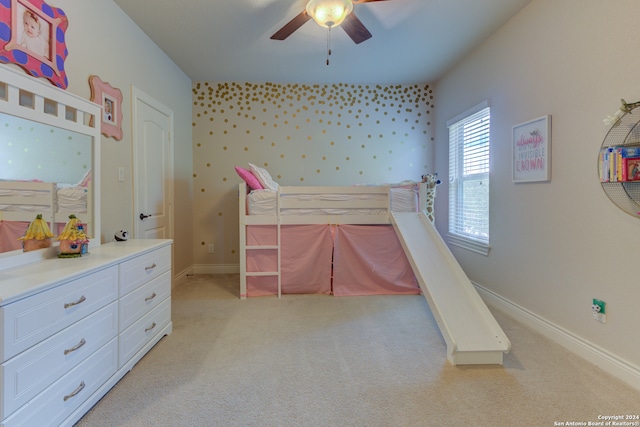 carpeted bedroom featuring ceiling fan