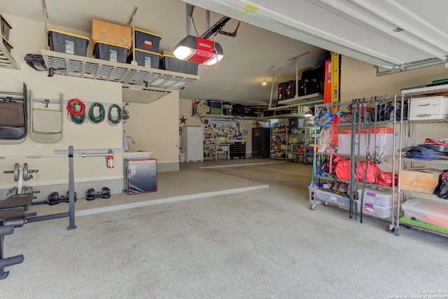 garage featuring a garage door opener