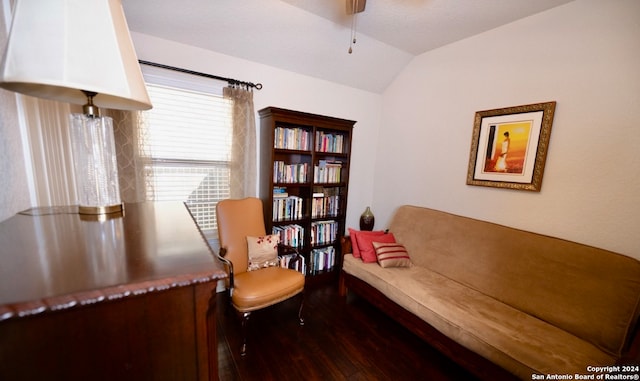 sitting room featuring lofted ceiling and hardwood / wood-style flooring