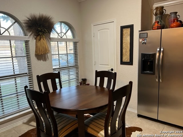 dining room with light tile patterned floors