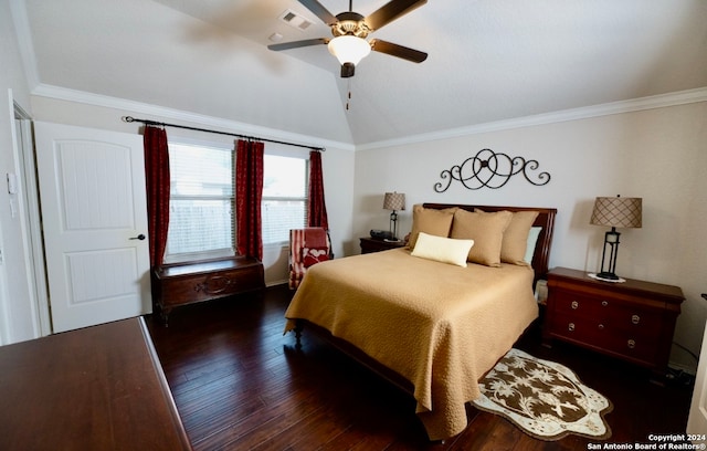 bedroom with crown molding, lofted ceiling, dark hardwood / wood-style floors, and ceiling fan