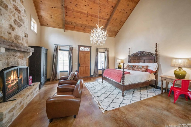 bedroom with high vaulted ceiling, wood ceiling, a notable chandelier, and a fireplace