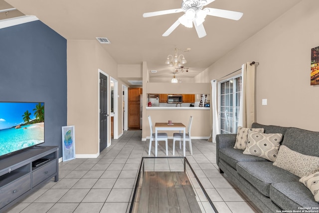 living room with light tile patterned floors and ceiling fan