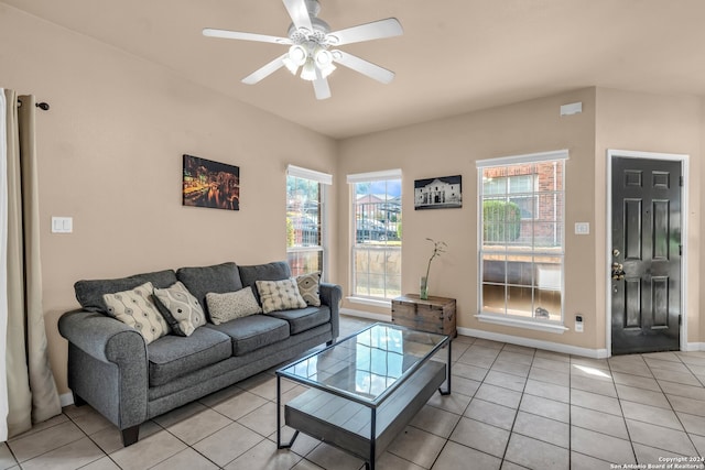 living room with light tile patterned floors and ceiling fan