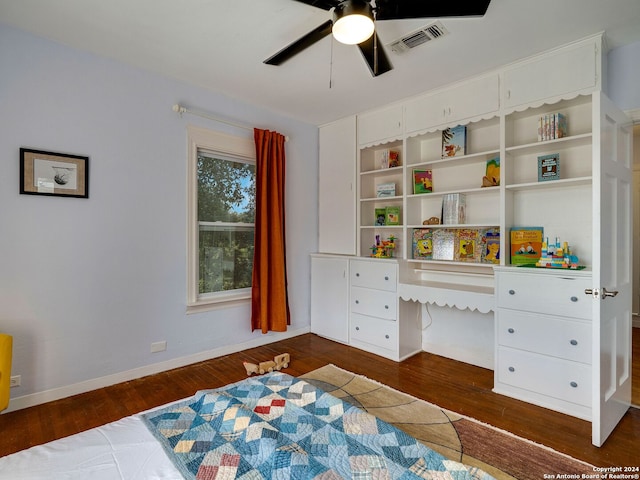 bedroom featuring ceiling fan and dark wood-type flooring