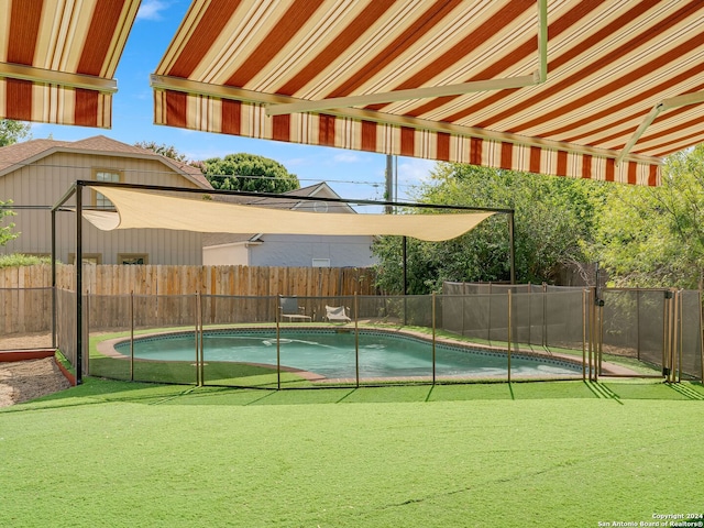 exterior space featuring a fenced in pool