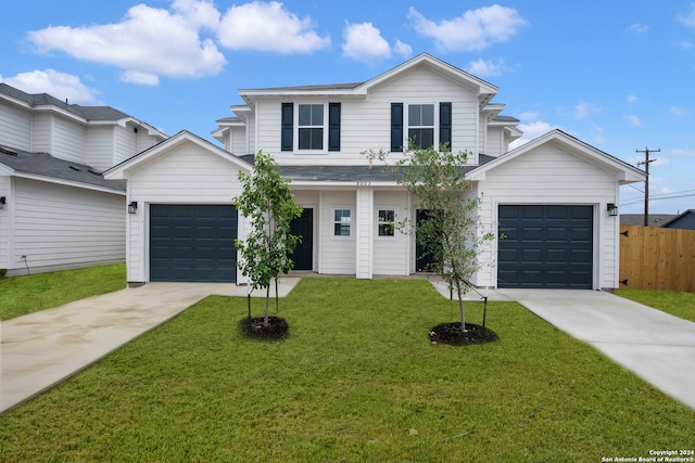 view of front facade featuring a front yard and a garage