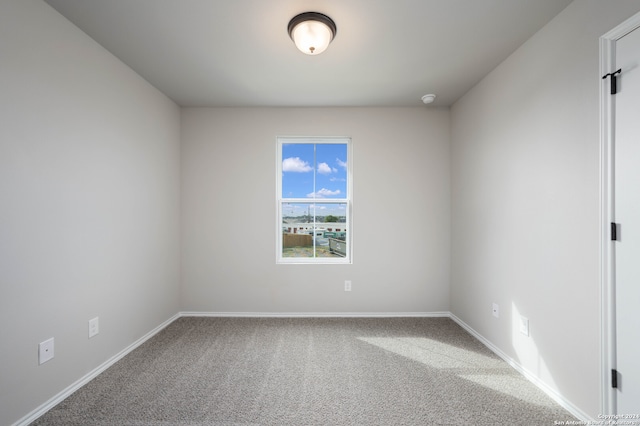 empty room featuring carpet floors