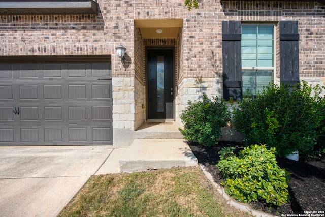 entrance to property with a garage