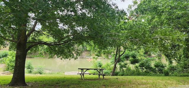 view of property's community with a water view