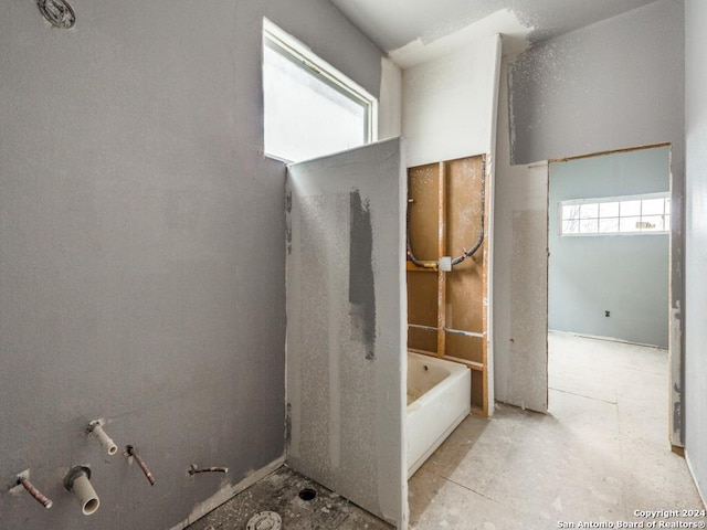 bathroom featuring a tub