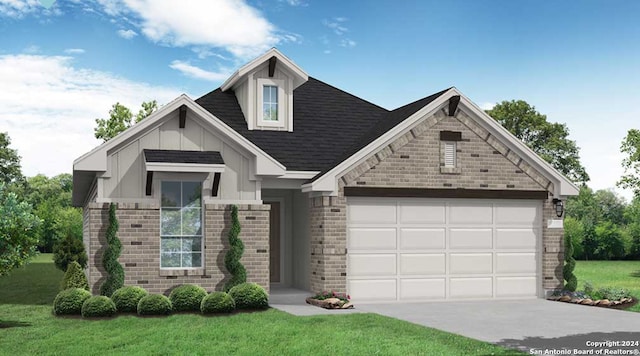 view of front facade with a front lawn and a garage