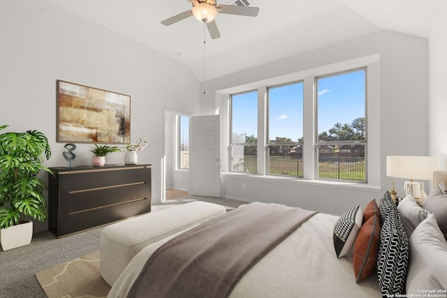 bedroom with carpet flooring, ceiling fan, and lofted ceiling