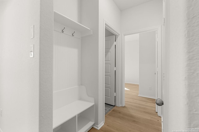 mudroom with light wood-type flooring