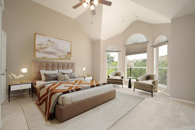 10606 Rainbow Vw, Helotes, TX 78023 - bedroom featuring a ceiling fan, baseboards, light carpet, and high vaulted ceiling
