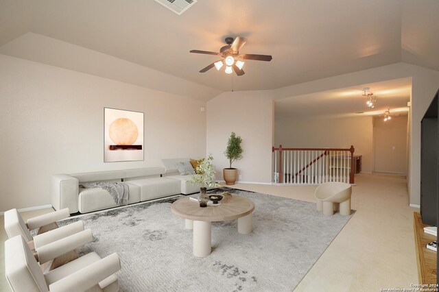 10606 Rainbow Vw, Helotes, TX 78023 - carpeted living room featuring a ceiling fan, vaulted ceiling, and visible vents