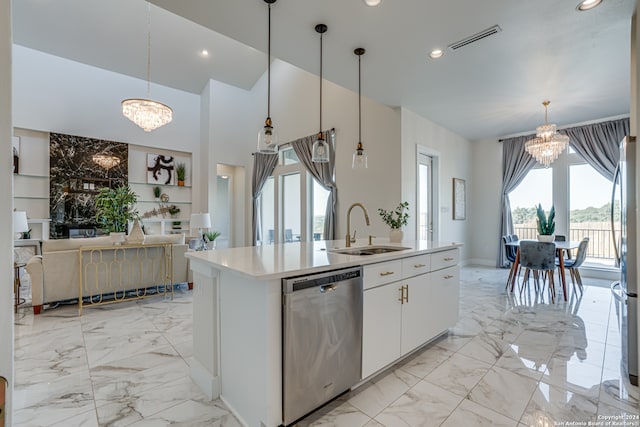 kitchen with pendant lighting, dishwasher, white cabinets, and a chandelier