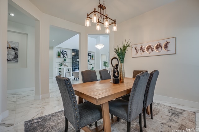 dining area with a chandelier