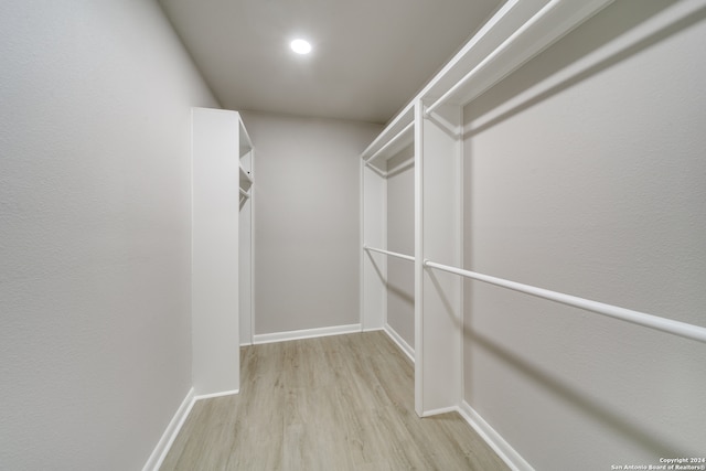 walk in closet featuring light wood-type flooring