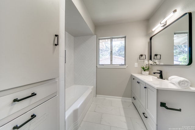 bathroom with a tub to relax in and vanity