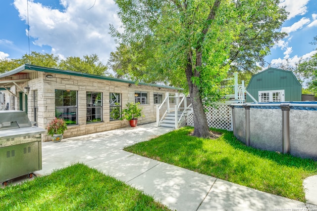 exterior space featuring a front lawn