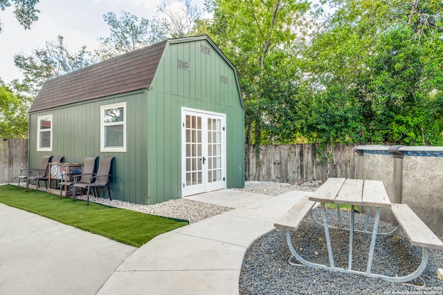 view of outdoor structure featuring french doors