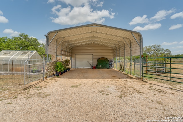 view of outdoor structure with a carport