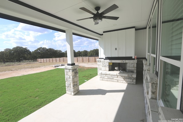 view of patio with ceiling fan