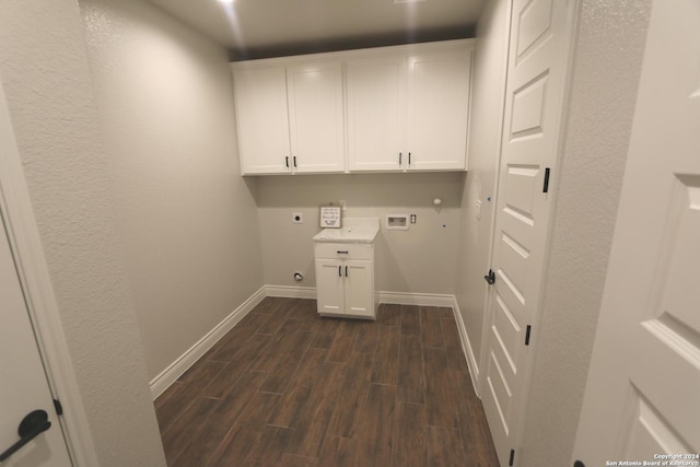 clothes washing area featuring hookup for a washing machine, cabinets, hookup for an electric dryer, and dark hardwood / wood-style flooring