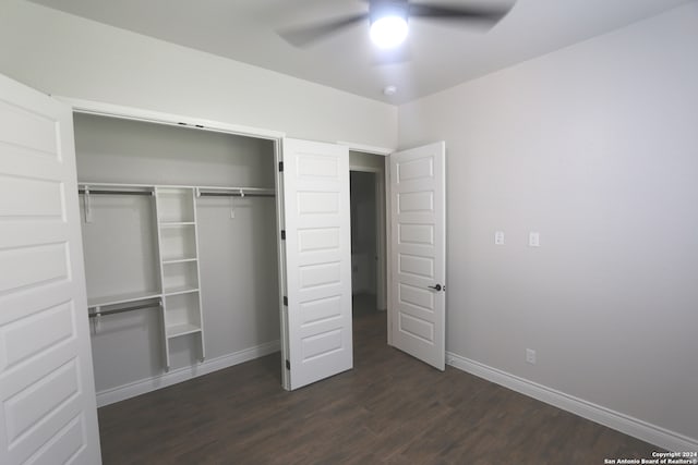 unfurnished bedroom featuring a closet, ceiling fan, and dark wood-type flooring