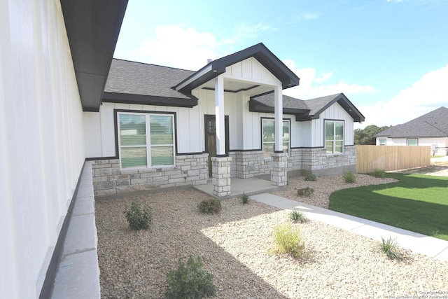 view of front of property with a front lawn