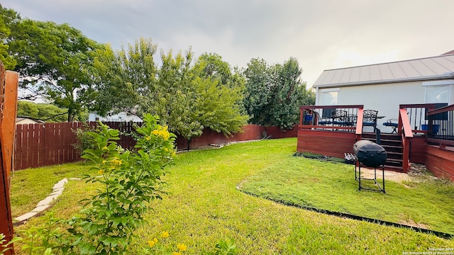 view of yard featuring a deck