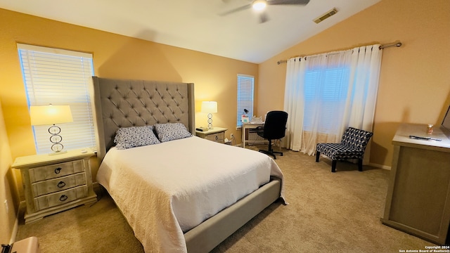 carpeted bedroom with lofted ceiling and ceiling fan