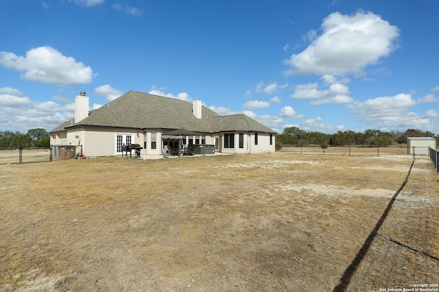 back of property featuring a patio area