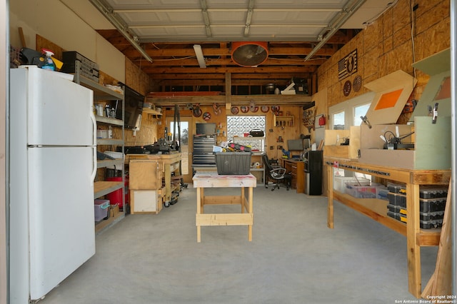 interior space with plenty of natural light and white refrigerator