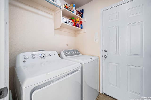 laundry room with washing machine and dryer