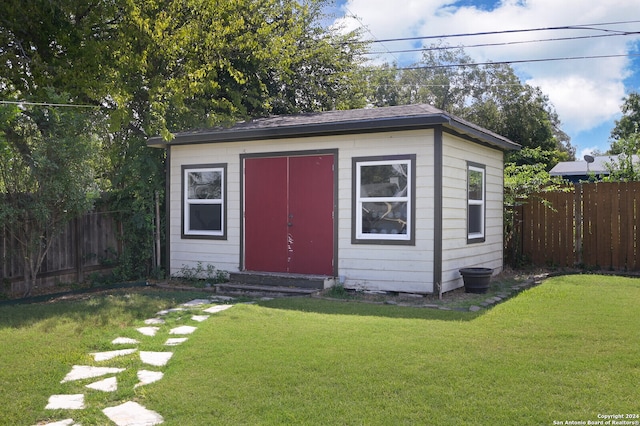 view of outdoor structure featuring a yard