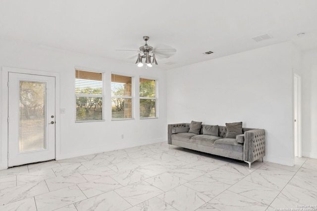 living room featuring ceiling fan