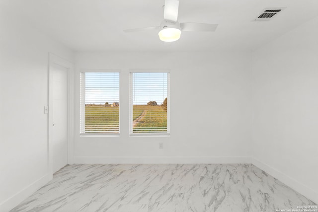 empty room with ceiling fan