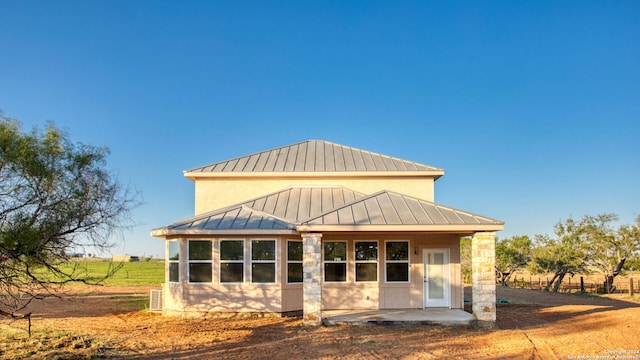 rear view of house featuring a patio area