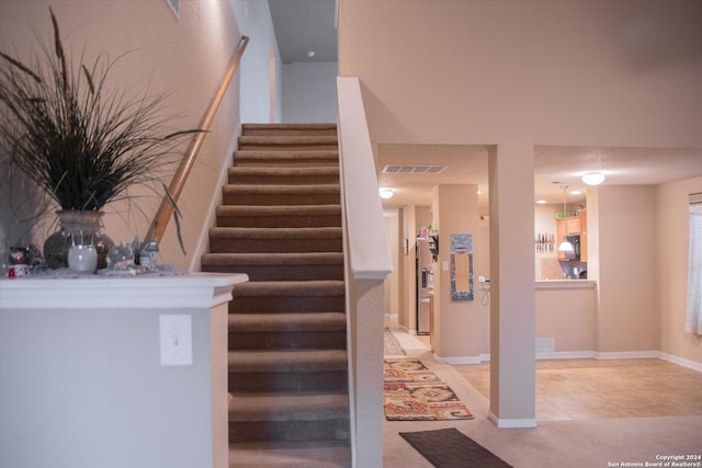 9171 Everton, San Antonio, TX 78245 - stairway with carpet floors and visible vents