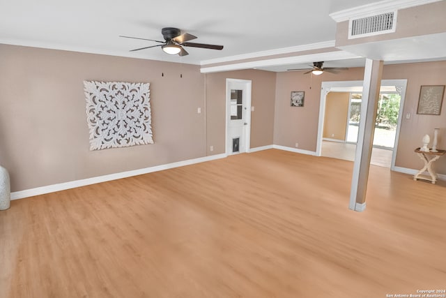 unfurnished room featuring ceiling fan, light hardwood / wood-style flooring, and ornamental molding