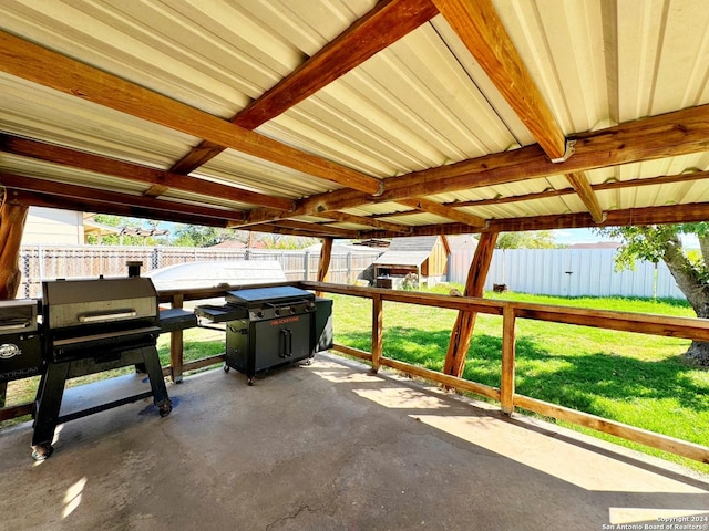 133 Rio Grande St, Uvalde, TX 78801 - view of patio with a storage shed and a grill