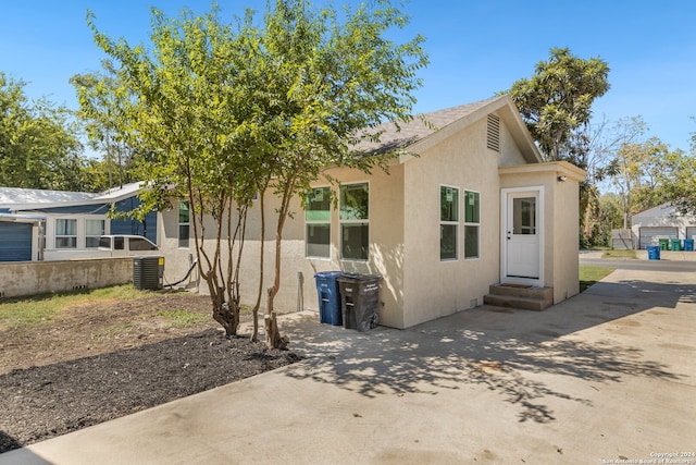 view of front of home featuring central AC unit