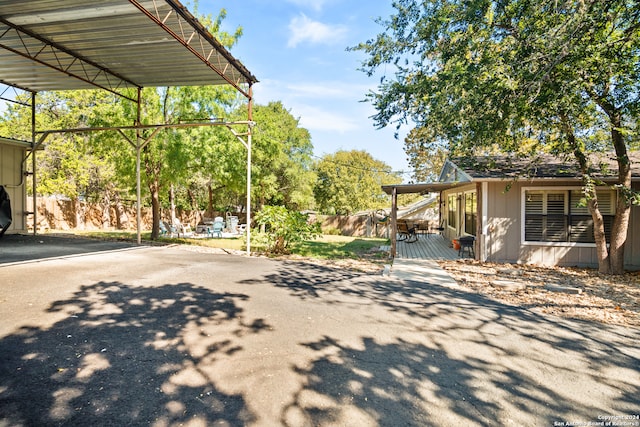 view of yard featuring a carport