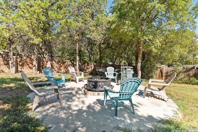 view of patio / terrace featuring a fire pit