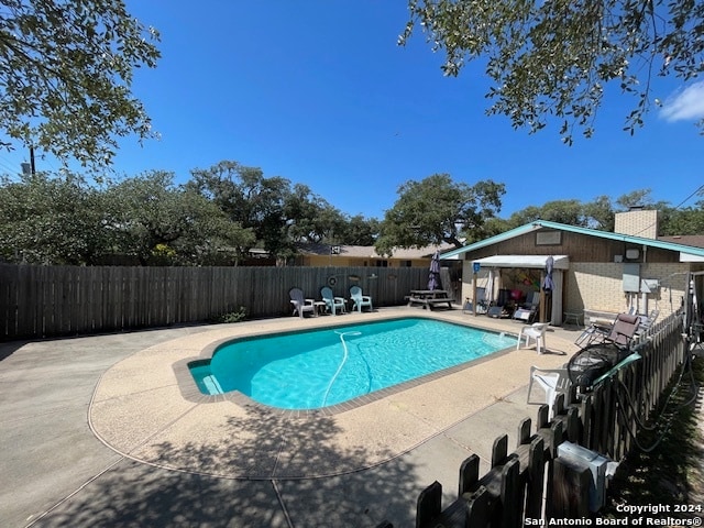 view of pool with a patio area