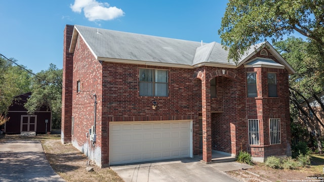 view of front of property with a garage