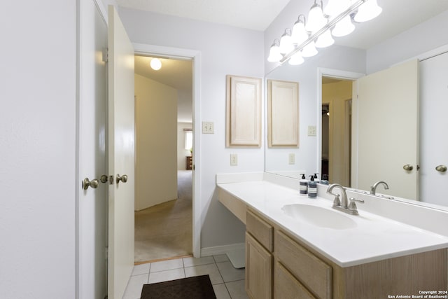 bathroom featuring tile patterned floors and vanity